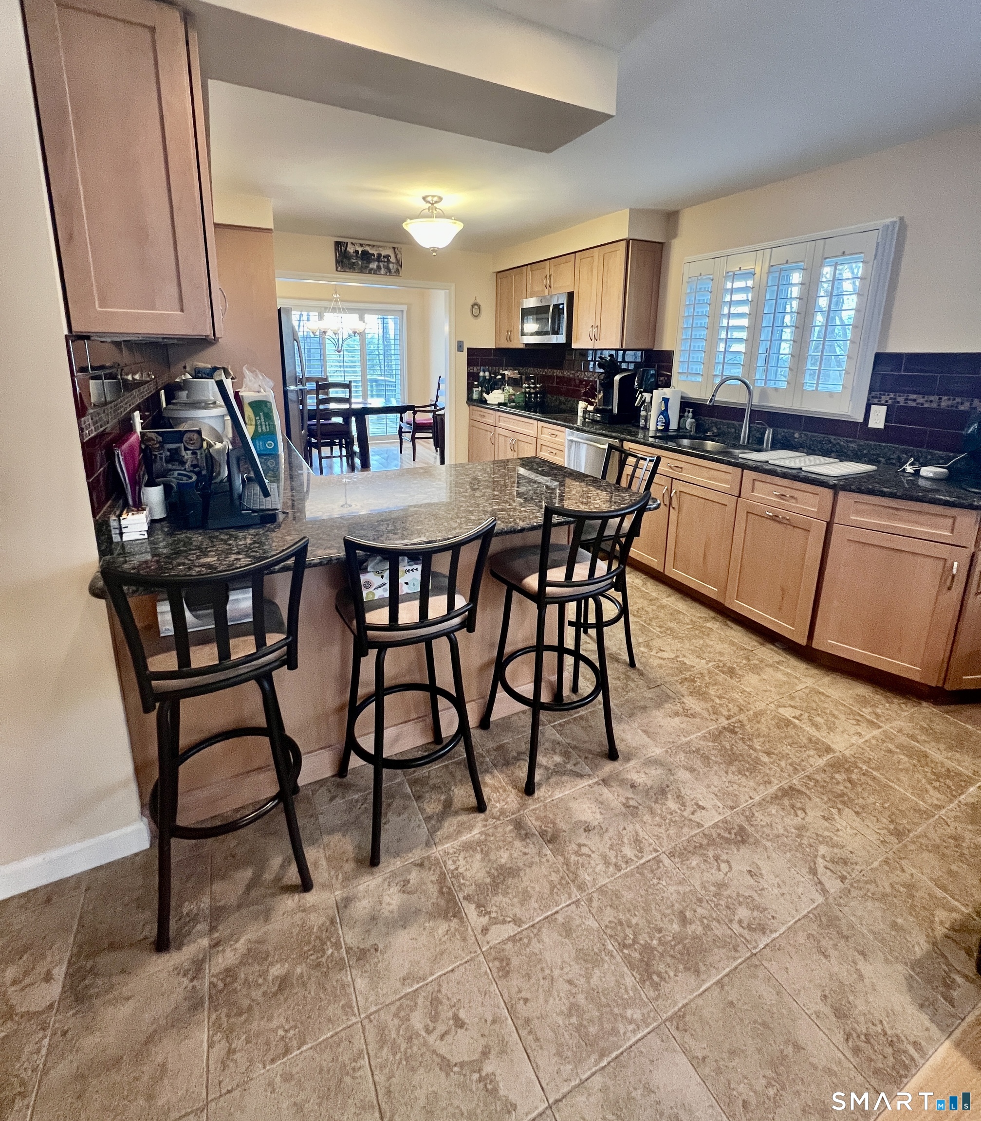 305 Cliffside Drive Torrington, CT 06790 - Photo 5 of 25 a view of a dining room with furniture