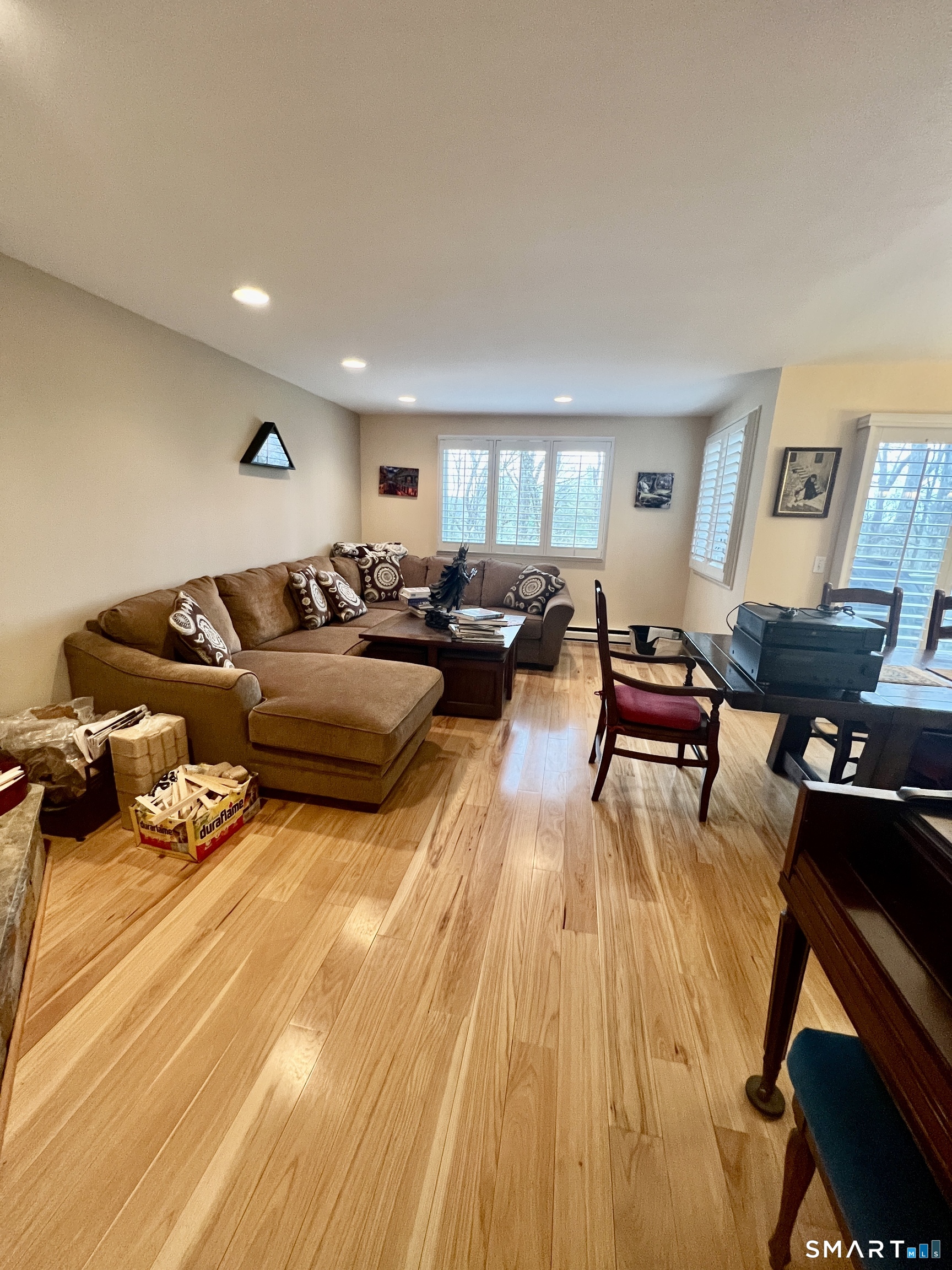 305 Cliffside Drive Torrington, CT 06790 - Photo 7 of 25 a living room with furniture and a wooden floor