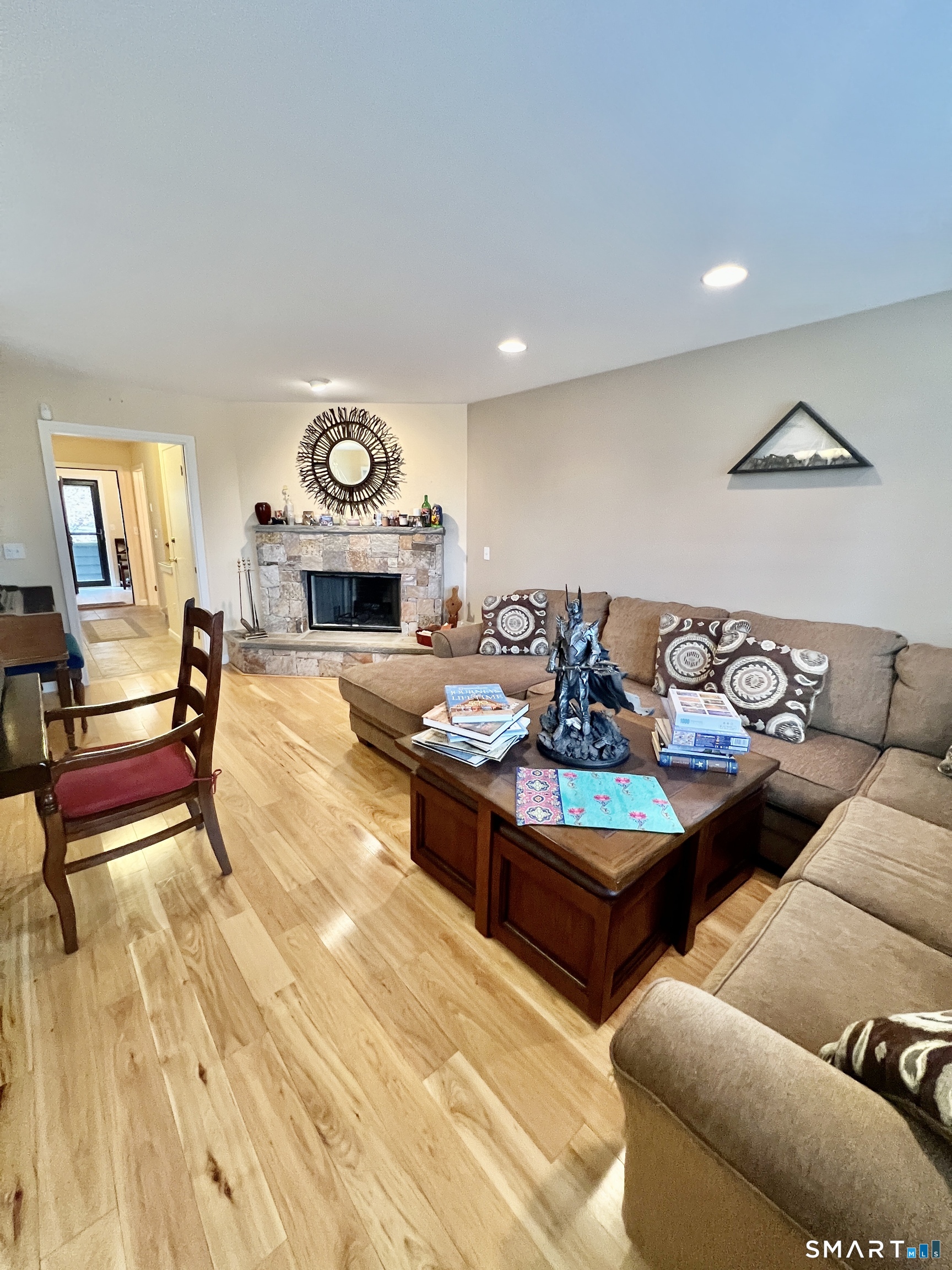 305 Cliffside Drive Torrington, CT 06790 - Photo 9 of 25 a living room with fireplace furniture and a rug