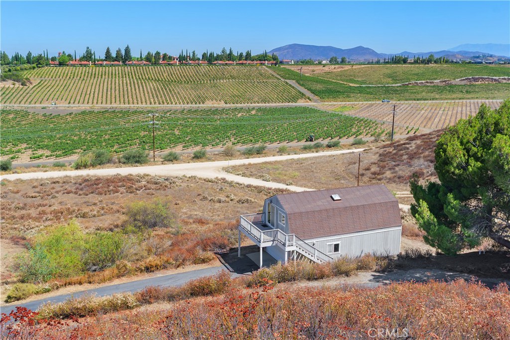 34881 Los Nogales Road Temecula, CA 92592 - Photo 7 of 50 Deck views facing the cabanas at South Coast Windery and beautiful vineyard views!