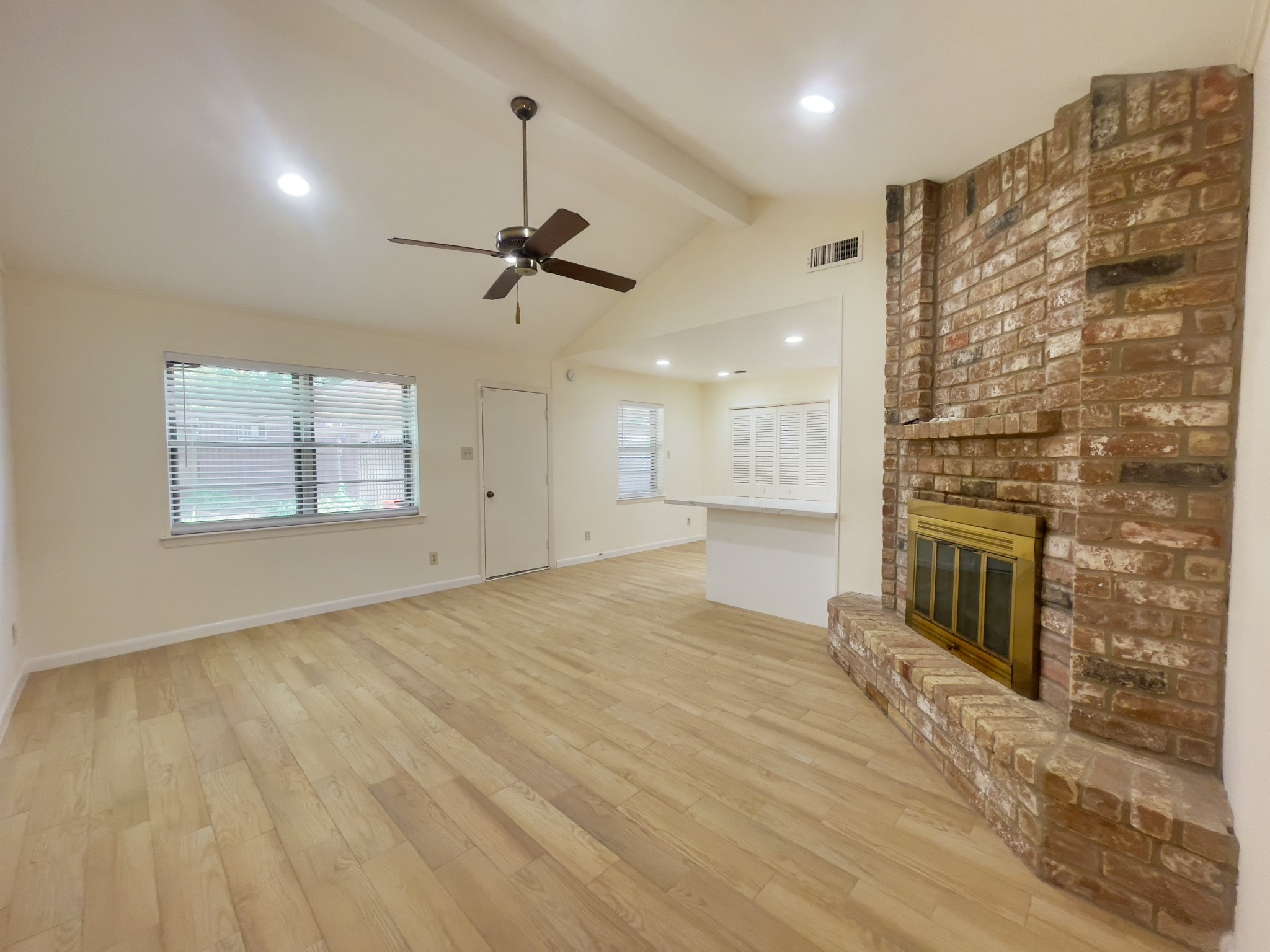 7710 Romney Road Houston, TX 77036 - Photo 5 of 31 a view of a livingroom with a fireplace
