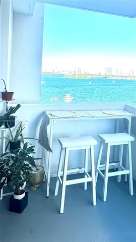 a room with a table and chairs