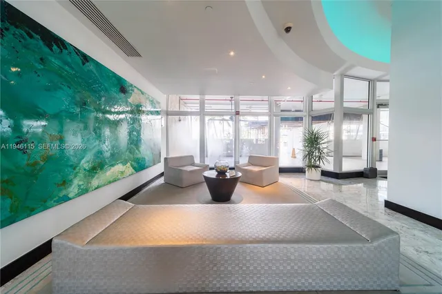 a view of a large swimming pool with a lake view