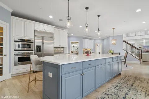 a living room with furniture and walk in closet