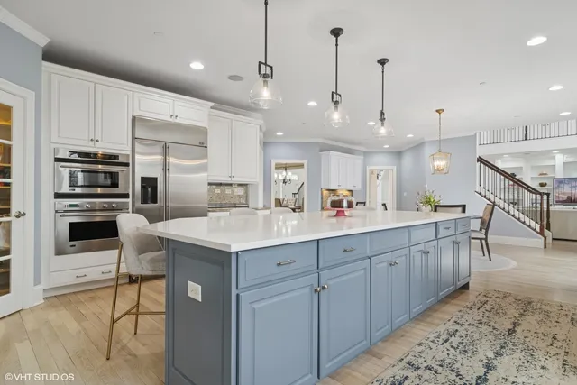 a living room with furniture and walk in closet