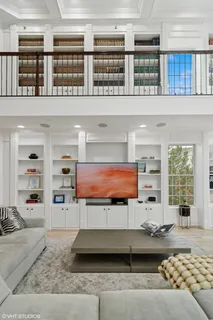 a spacious bathroom with a sink a mirror and a shower