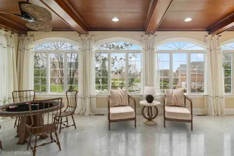 a view of staircase with white walls and windows