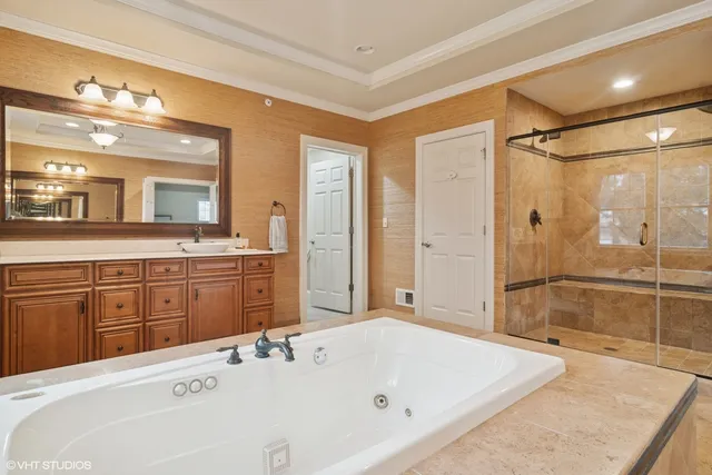 a room with pool table and windows