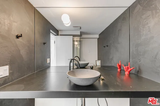 a view of a living room and a wooden floor