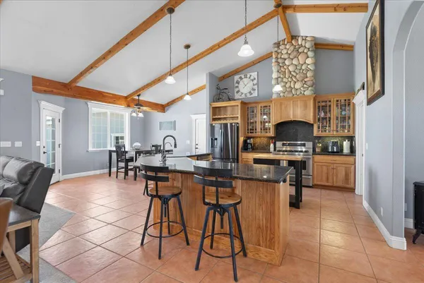 a view of a livingroom with furniture and windows