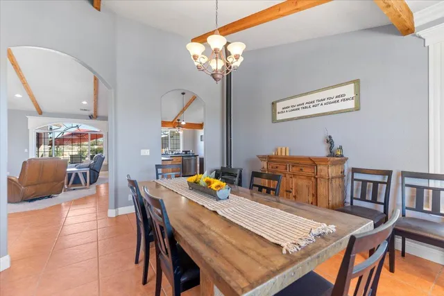 a view of a house with a yard balcony and swimming pool