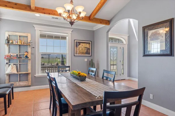 a view of a house next to a yard