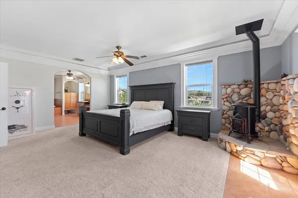 a view of a field with an ocean view