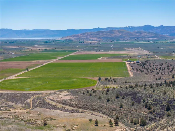 a view of a kitchen with furniture and a chandelier
