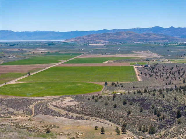 a view of a kitchen with furniture and a chandelier