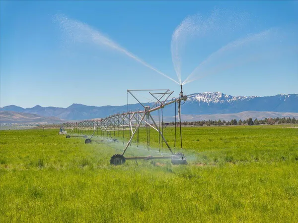 a kitchen with stainless steel appliances granite countertop a stove and cabinets