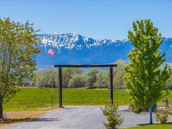 a kitchen with stainless steel appliances granite countertop a stove and a refrigerator