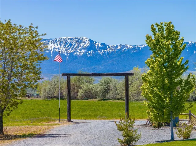 a kitchen with stainless steel appliances granite countertop a stove and a refrigerator