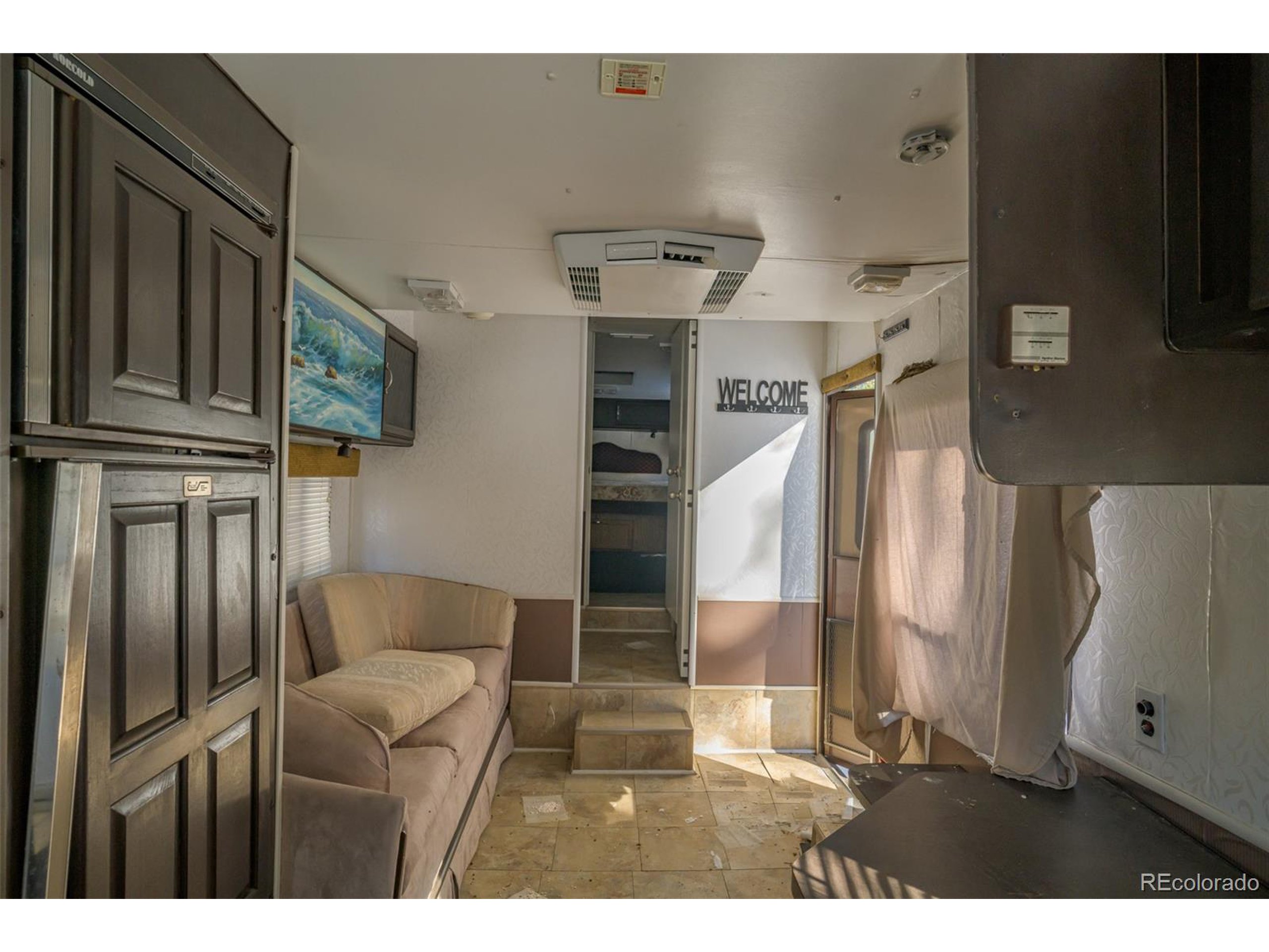Escondido Road Weston, CO 81091 - Photo 17 of 48 a view of a livingroom with furniture and staircase