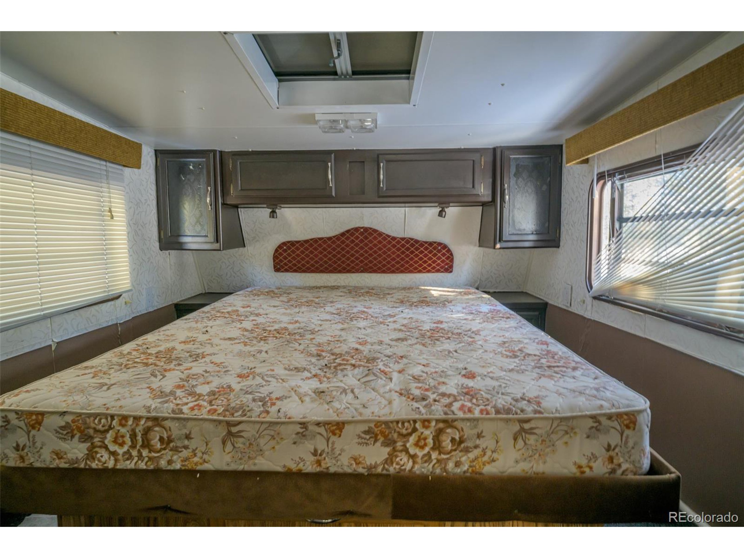 Escondido Road Weston, CO 81091 - Photo 19 of 48 a bedroom with a bed and window