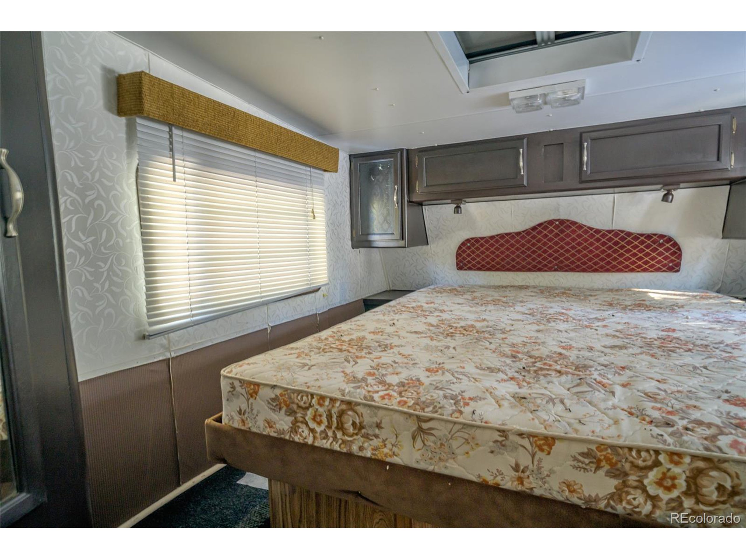 Escondido Road Weston, CO 81091 - Photo 20 of 48 a bedroom with a bed and a window