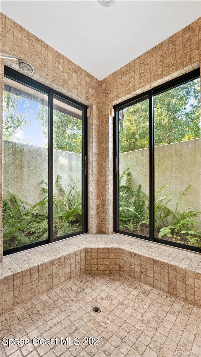 4455 Lake Washington Road Melbourne, FL 32934 - Photo 31 of 53 a view of a garden from a windows room