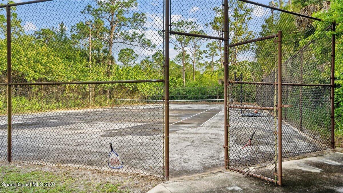 4455 Lake Washington Road Melbourne, FL 32934 - Photo 49 of 53 a view of a wrought fence