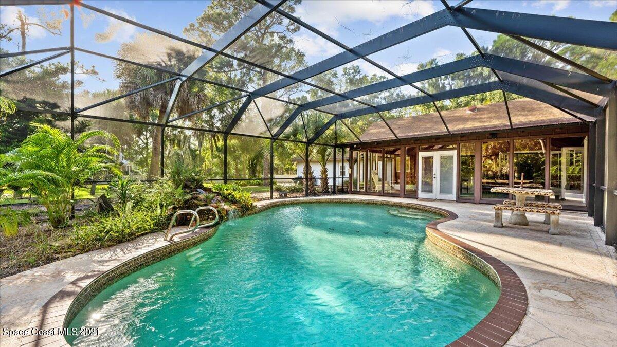 4455 Lake Washington Road Melbourne, FL 32934 - Photo 9 of 53 a view of swimming pool with a patio