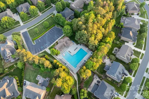 an aerial view of a house with a garden