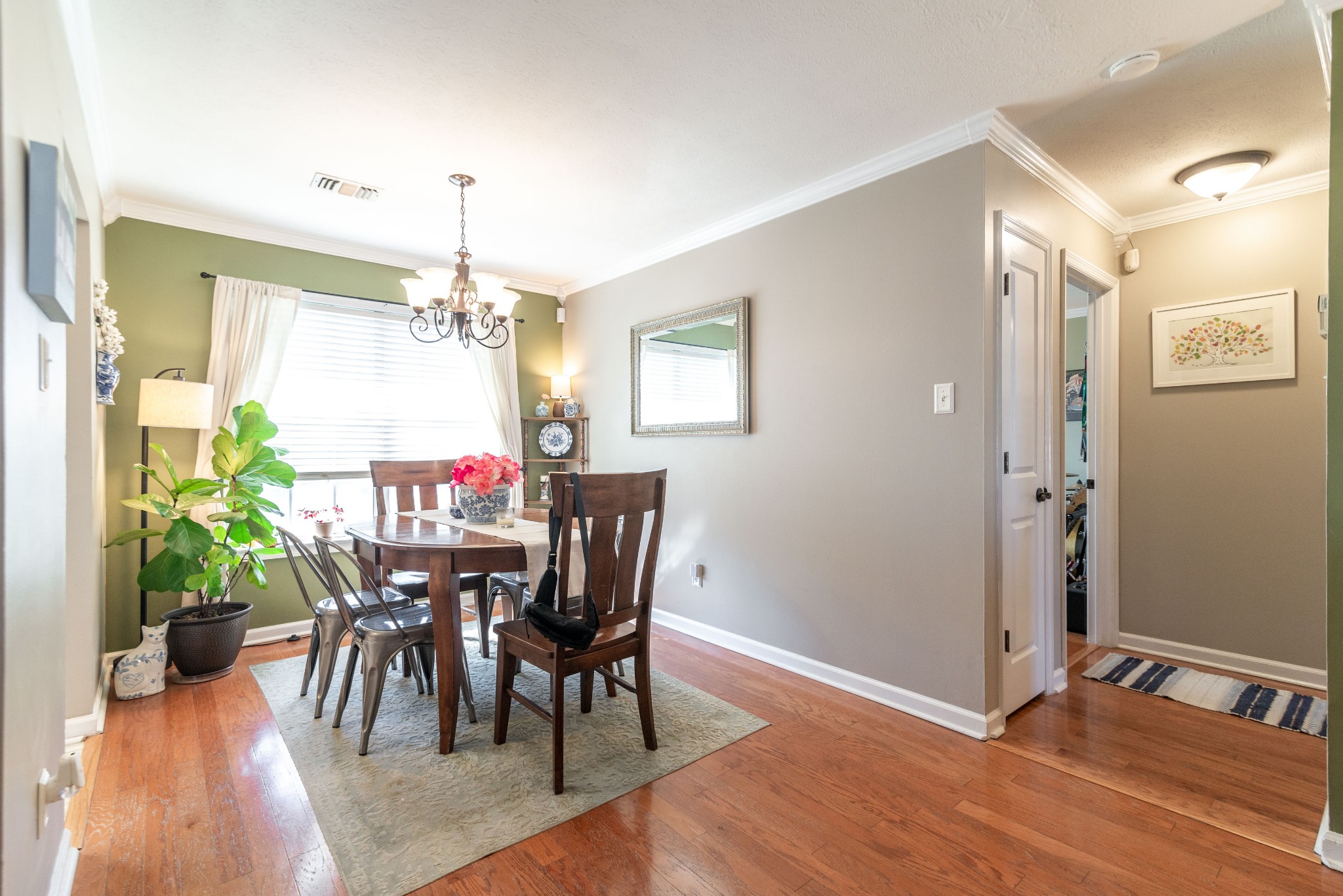 445 Parkside Circle Lebanon, TN 37087 - Photo 11 of 25 a view of a dining room with furniture window and wooden floor