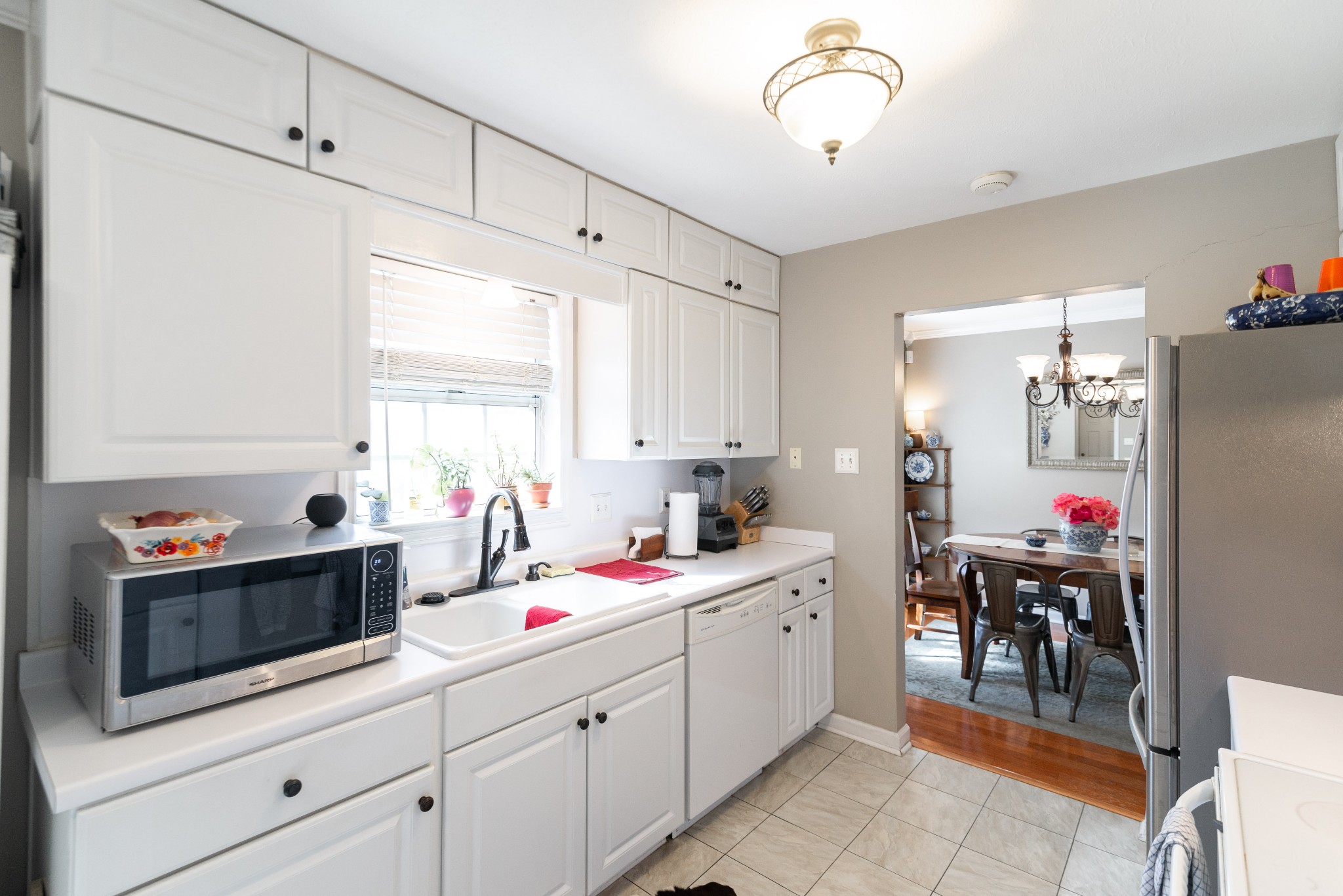 445 Parkside Circle Lebanon, TN 37087 - Photo 12 of 25 a kitchen that has a lot of cabinets a island and appliances in it