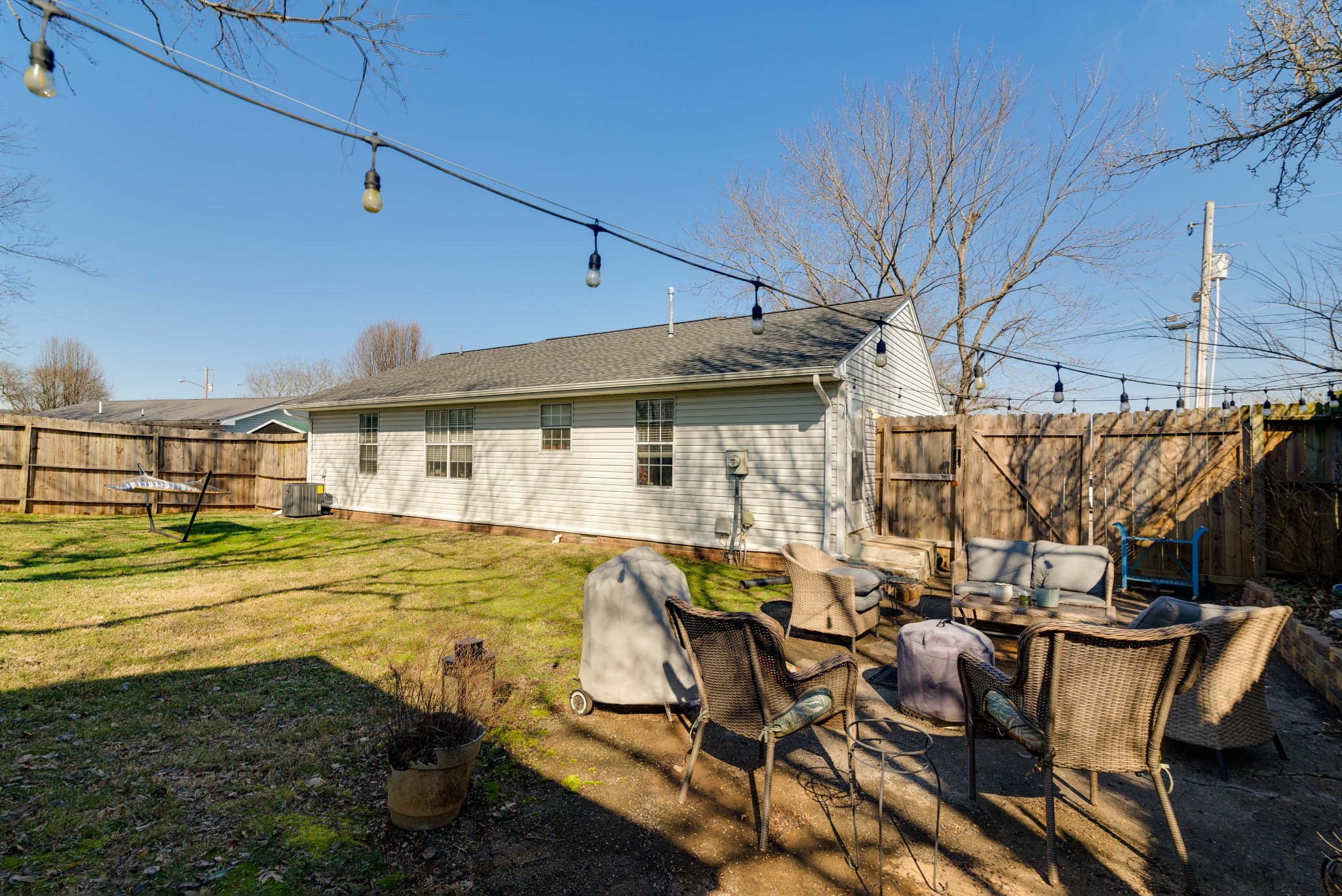 445 Parkside Circle Lebanon, TN 37087 - Photo 20 of 25 a view of a patio with table and chairs with wooden floor and fence