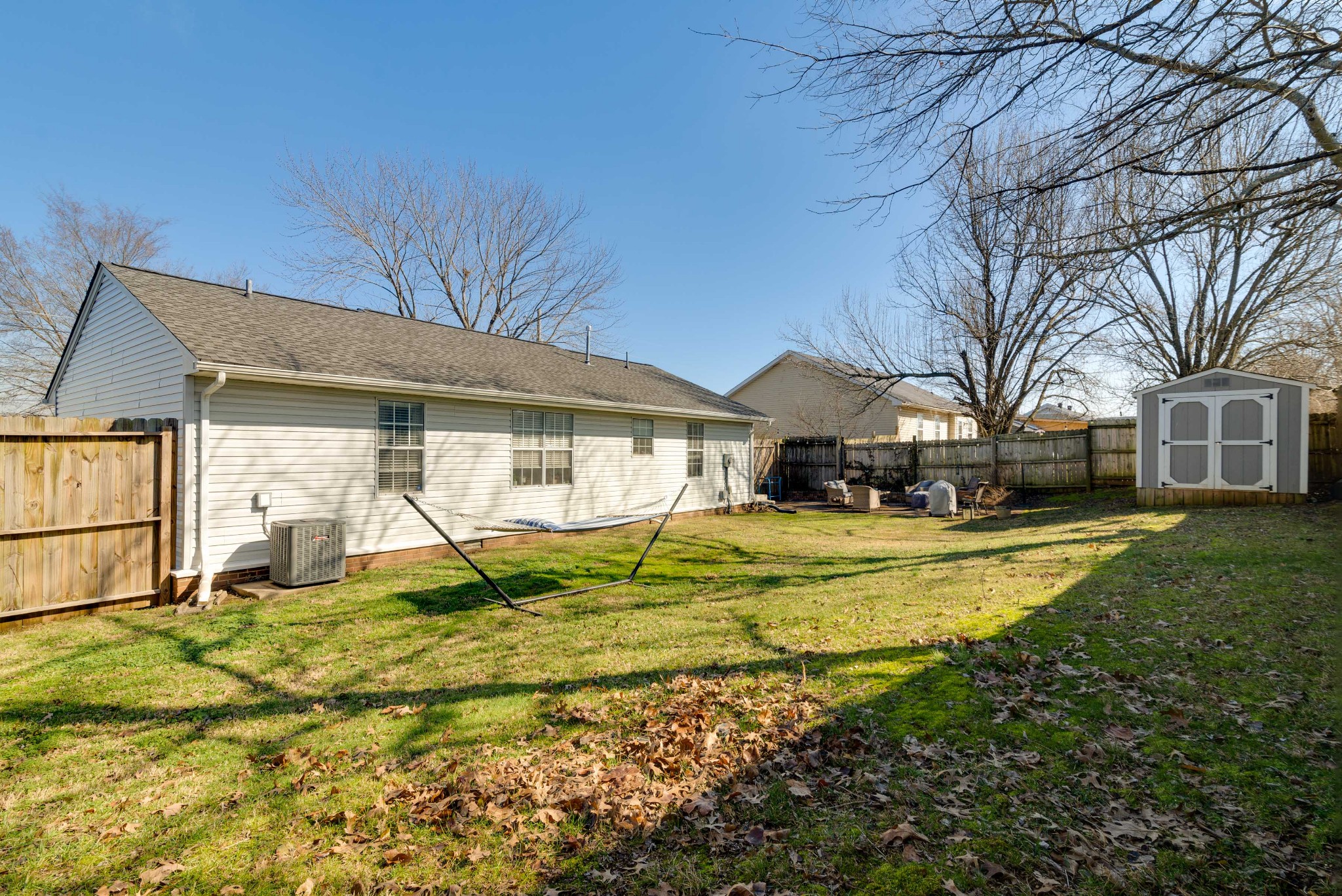 445 Parkside Circle Lebanon, TN 37087 - Photo 22 of 25 a house that has a big yard with wooden fence