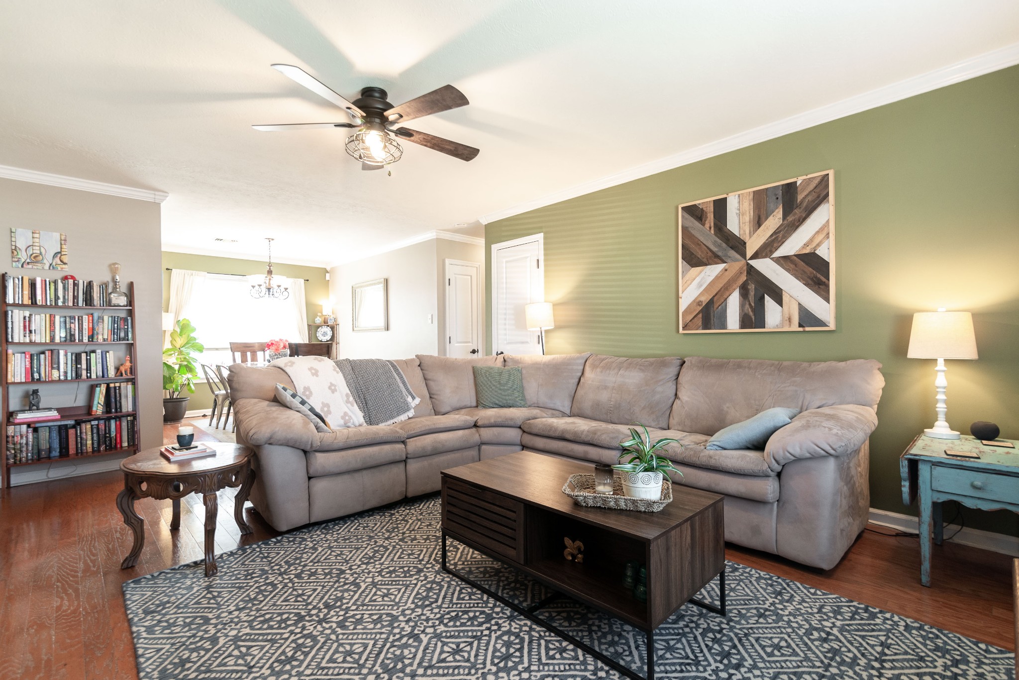 445 Parkside Circle Lebanon, TN 37087 - Photo 3 of 25 a living room with furniture a rug and a lamp
