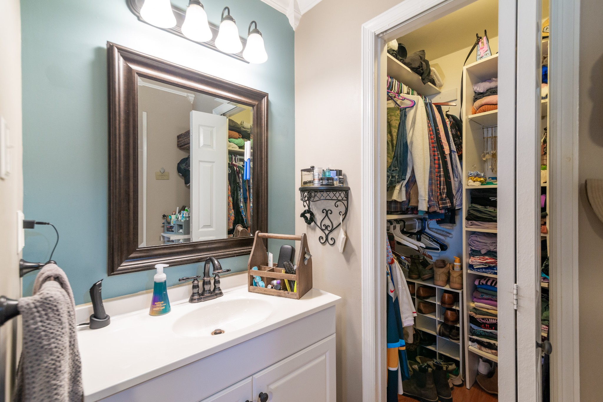 445 Parkside Circle Lebanon, TN 37087 - Photo 7 of 25 a bathroom with a sink vanity and a mirror