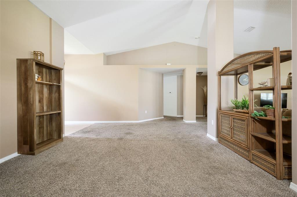 11 Riddle Drive Palm Coast, FL 32164 - Photo 13 of 33 a view of an empty room and kitchen view