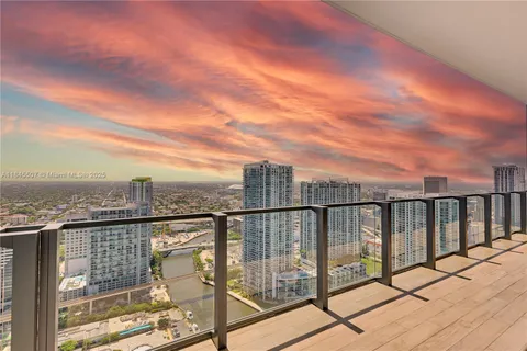 a view of a balcony with city view