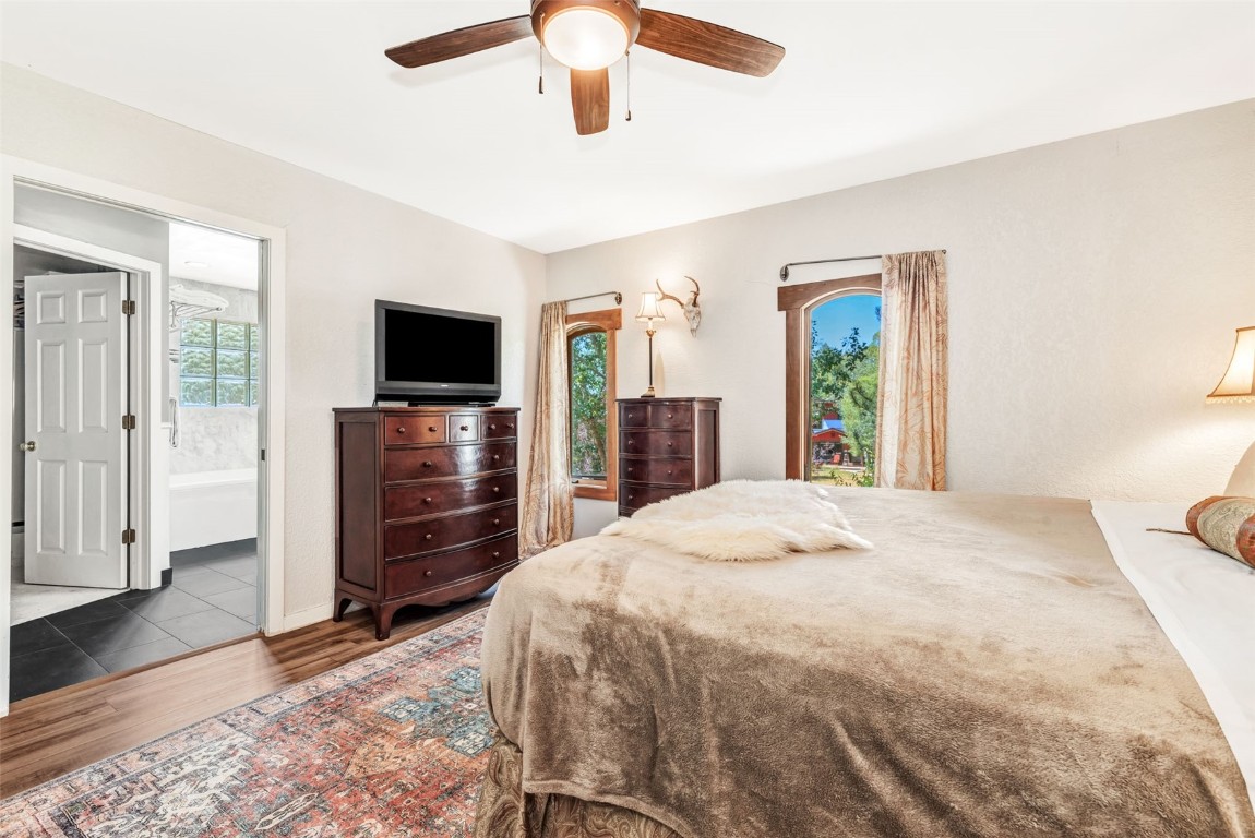 424 3rd Street Steamboat Springs, CO 80487 - Photo 23 of 48 a bedroom with a bed and a flat screen tv