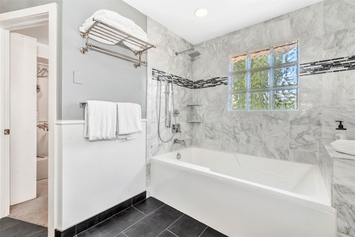 424 3rd Street Steamboat Springs, CO 80487 - Photo 25 of 48 a bathroom with a bathtub and a shower