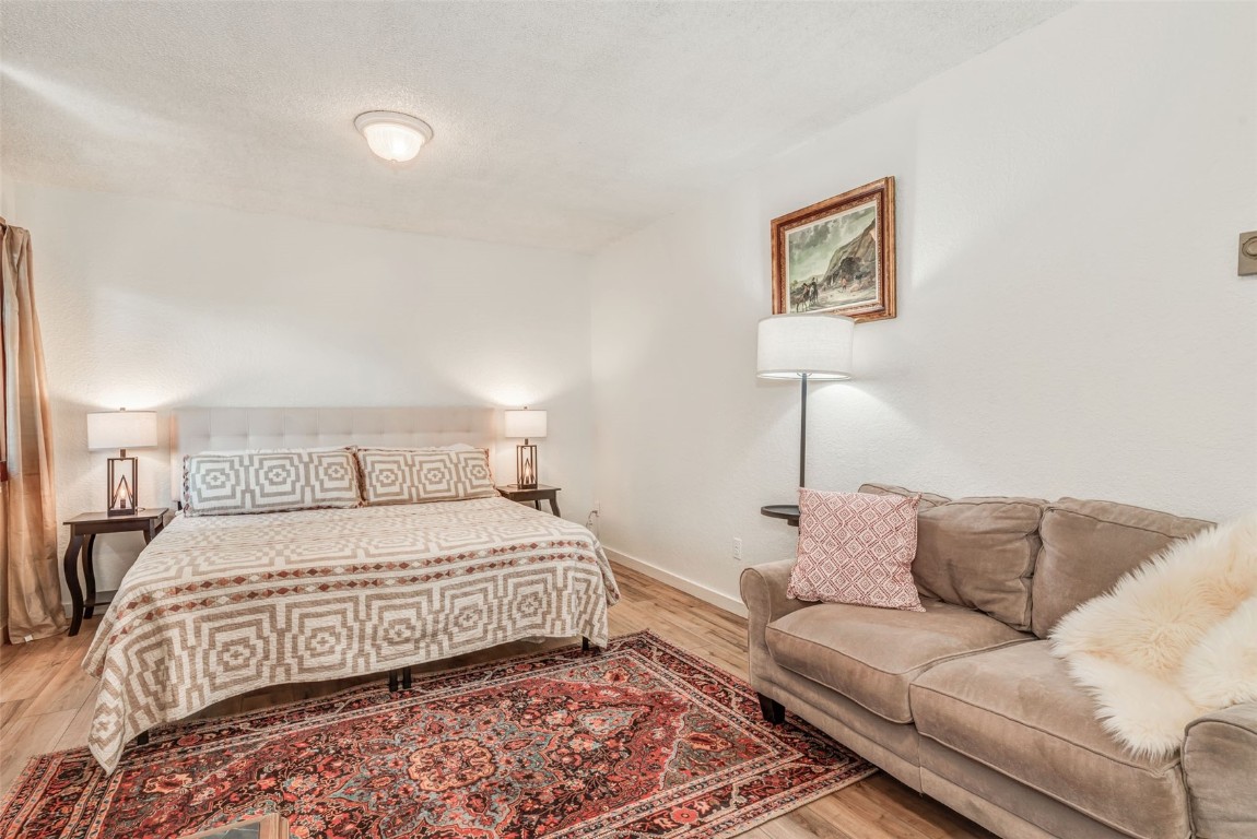 424 3rd Street Steamboat Springs, CO 80487 - Photo 29 of 48 a bedroom with a bed and a couch