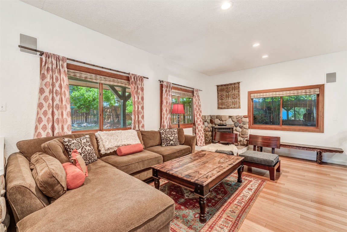 424 3rd Street Steamboat Springs, CO 80487 - Photo 4 of 48 a living room with furniture and a flat screen tv
