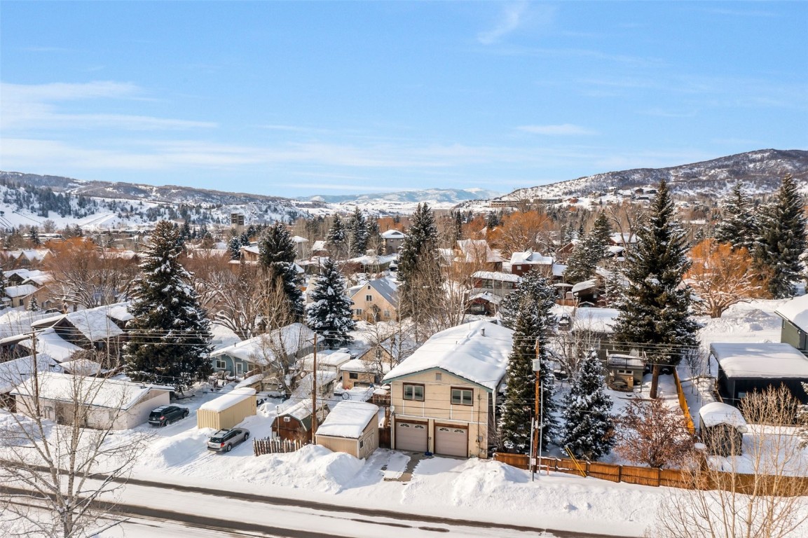 424 3rd Street Steamboat Springs, CO 80487 - Photo 48 of 48 an aerial view of residential houses with city view
