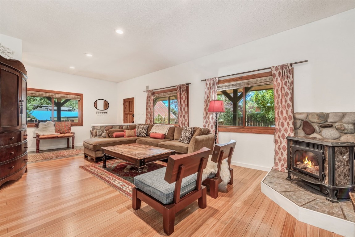 424 3rd Street Steamboat Springs, CO 80487 - Photo 6 of 48 a living room with furniture and a wooden floor