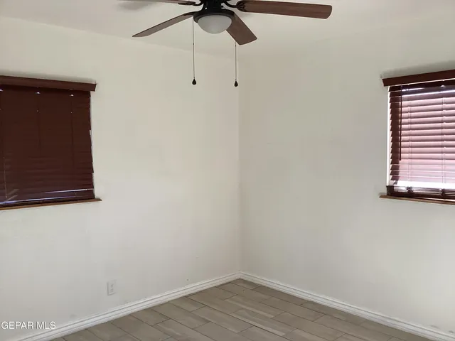 a view of a backyard of the house