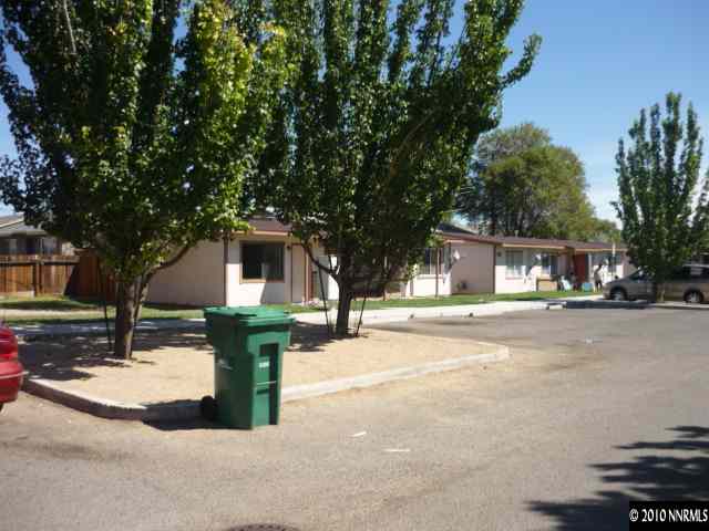 4170 Neil Road, Unit 15S Reno, NV 89502 - Photo 2 of 8 a front view of a house with a yard