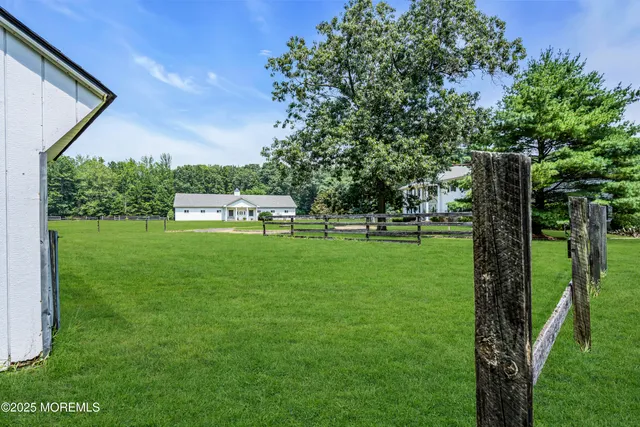 a view of a swimming pool with a garden
