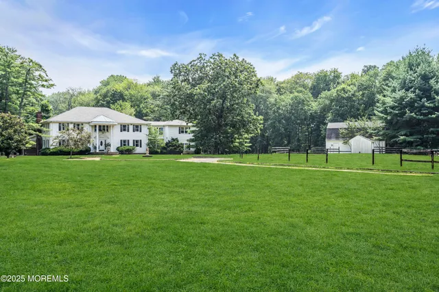 a house view with garden space