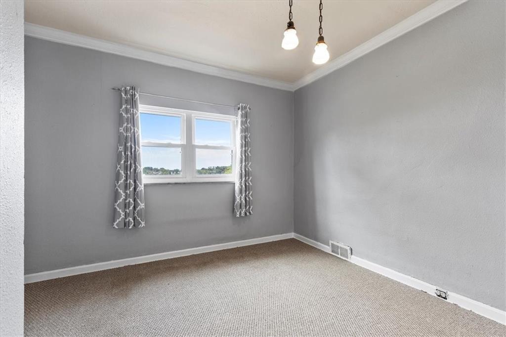 1622 Methyl Street Pittsburgh, PA 15216 - Photo 22 of 45 an empty room with windows and closet