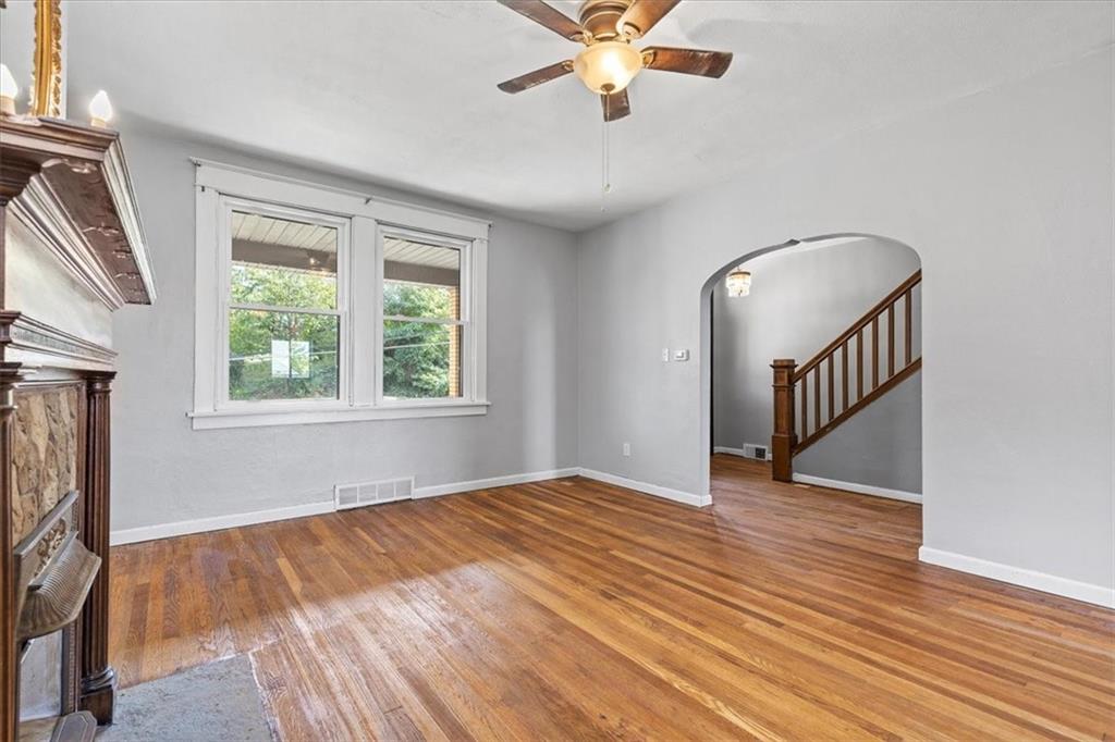 1622 Methyl Street Pittsburgh, PA 15216 - Photo 7 of 45 a view of an empty room with wooden floor and a window