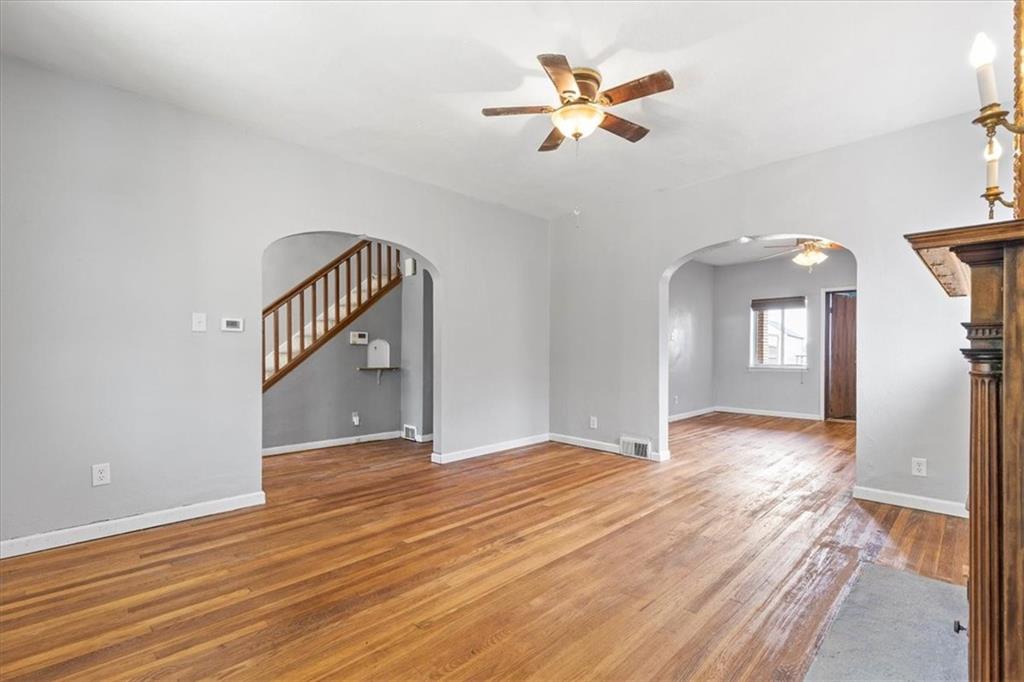 1622 Methyl Street Pittsburgh, PA 15216 - Photo 9 of 45 wooden floor in an empty room with a window